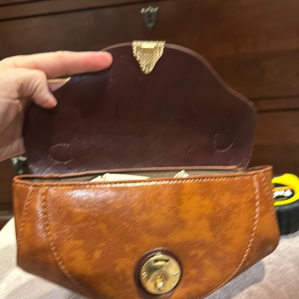 Brown Vegan Leather Clutch with Decorative Clasp and Structured Design - Picture 4 of 9